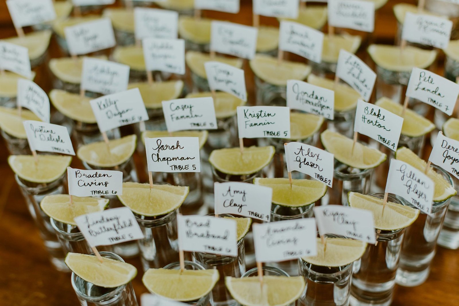 Tequila seating card ideas with lemon and name tag at Wedding venue The Cape by Thompson Hotels in Los Cabos Mexico