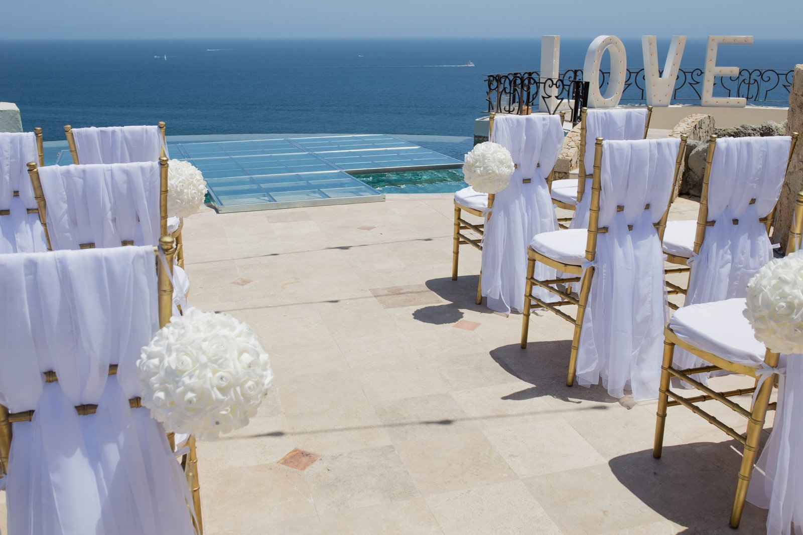 Ceremony chair setup before ceremony at Villa la Roca in Cabo San Lucas Pedregal