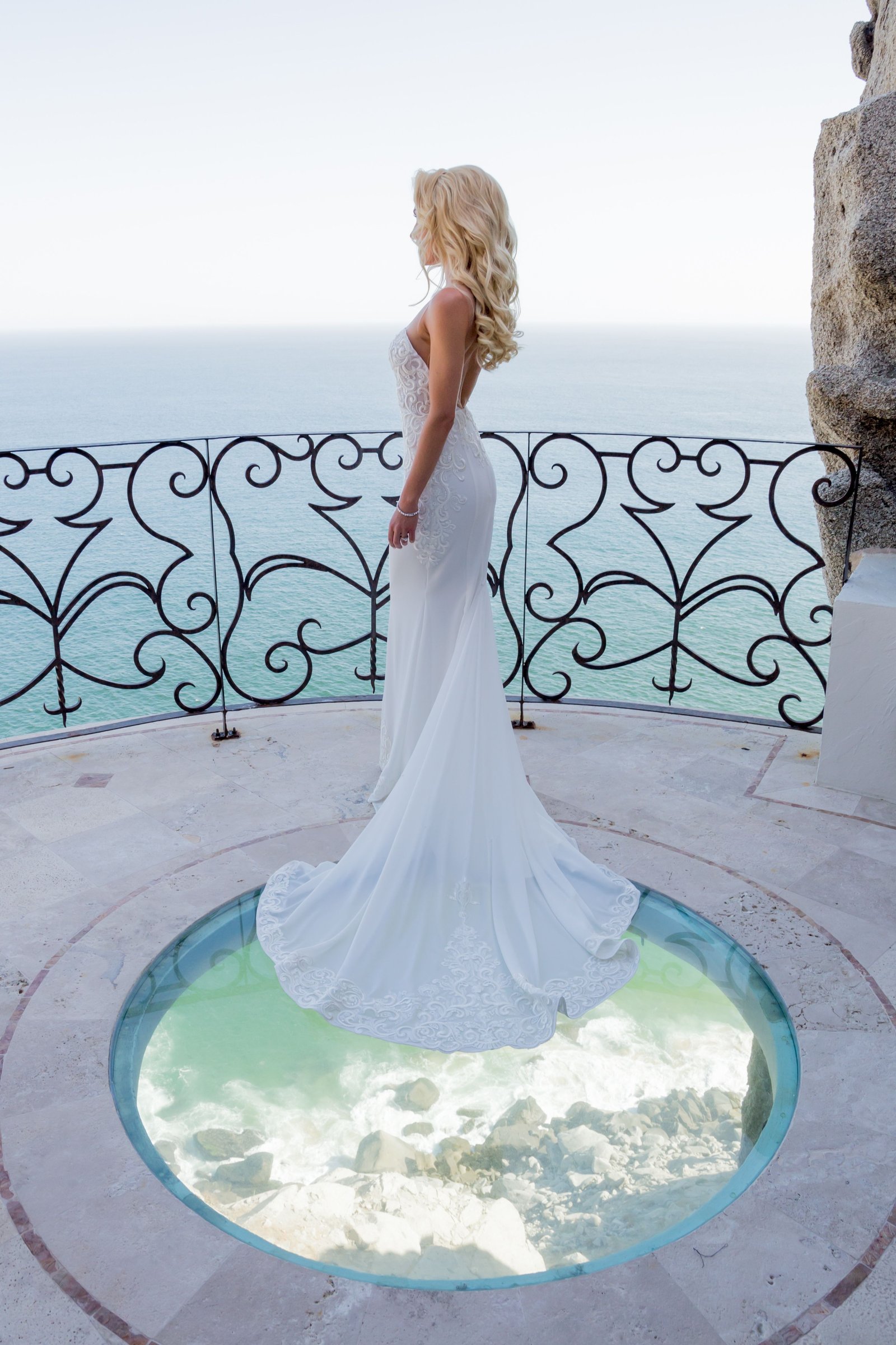 Bride having her photo session after wedding ceremony at Villa la Roca Pedregal Los Cabos