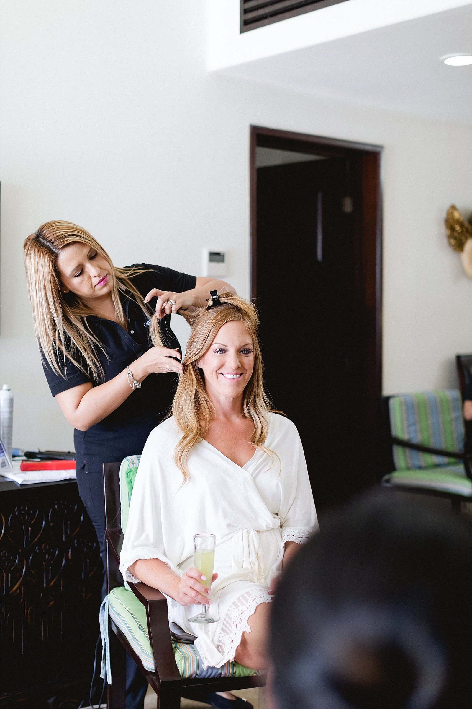 Bride getting her hair and makeup done by Alma Vallejo from Cabo Makeup, at her Hotel Hotel Hacienda Encantada, in Cabo San Lucas. The Bride Jaclyn and all of her Bridesmaids got ready at Hacienda Encantada in Los Cabos, Mexico. Wedding Planning by Cabo Wedding Services