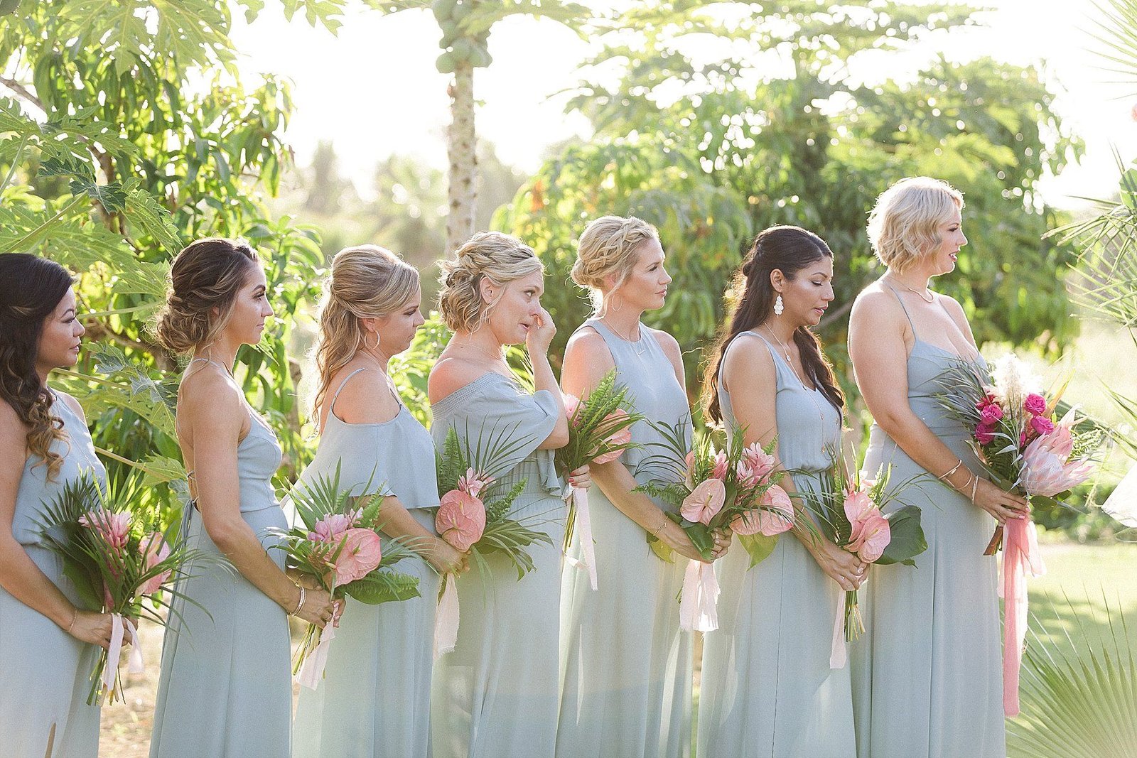 Bridesmaids standing during Wedding Ceremony at Flora Farms in Cabo San Lucas Mexico. Destination Wedding Planning by Cabo Wedding Services. Wedding Photography by Sara Richardson