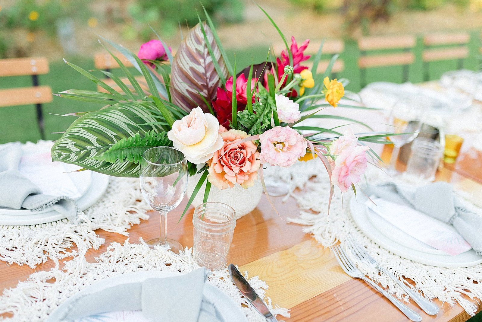 Table Centerpiece at Wedding during a Destination wedding in Los Cabos Mexico, at Flora Farms Wedding Venue. Wedding Planning by Cabo Wedding Services. Photography by Sara Richardson