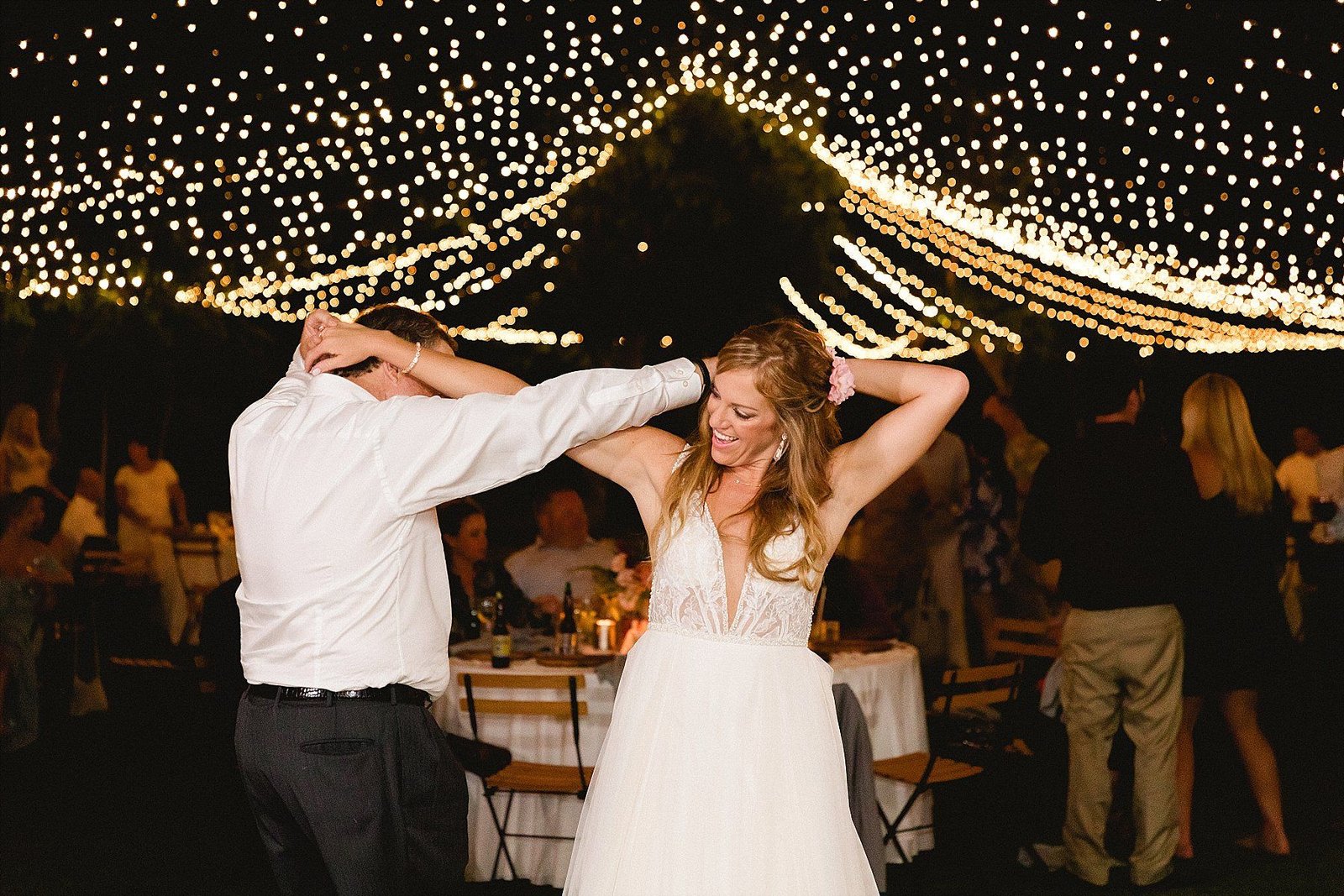 Bride and her Father doing the Father Daughter dance at their Wedding at Flora Farms, Cabo San Lucas, Mexico. Destination wedding Planning by Cabo Wedding Services. Photography by Sara Richardson