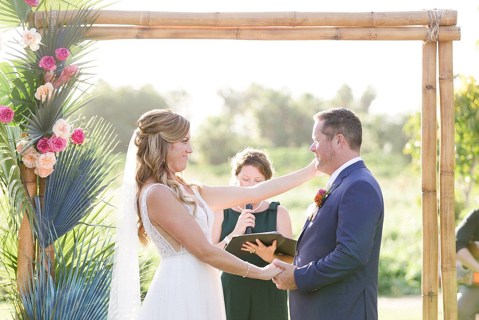 Bride and Groom at Ceremony alter. Wedding Planning by Cabo Wedding Services. Wedding Venue at Flora Farms. One of the best Destination Wedding Locations in Mexico.