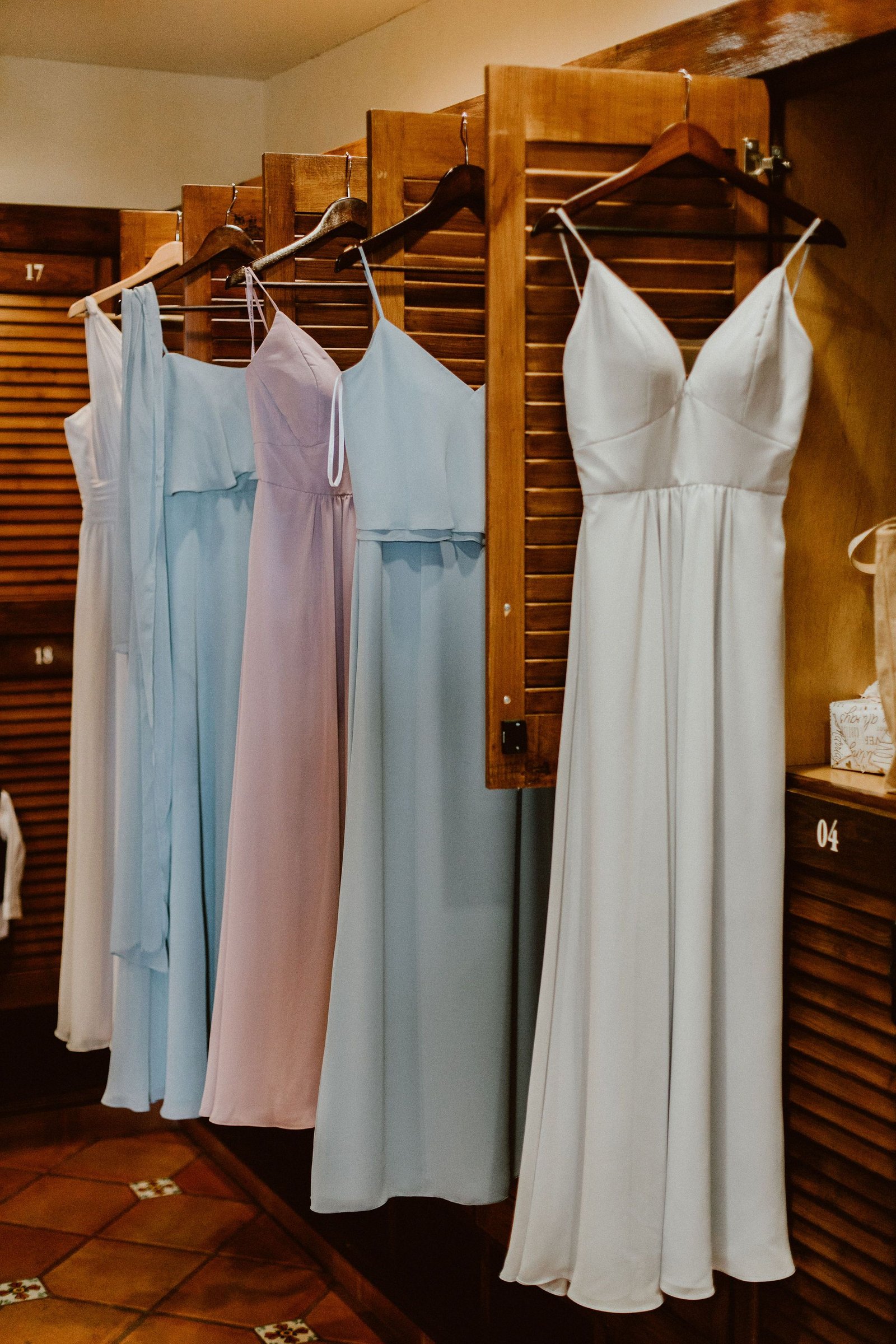 Bridesmaid Dresses hung in the Bridal Suite at Cabo del Sol Club House in Cabo San Lucas Mexico. This was Jen and Ians Wedding day in January, 2019. This was our First Wedding of the year. There were 50 of their best friends and family.