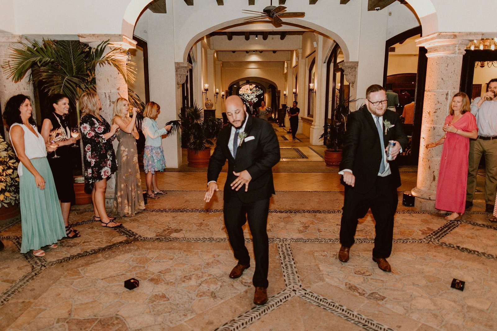 Groomsmen dancing at the Bridal Party Grand Entrance, prior to the Bride and Groom entering. Wedding Destination at Cabo del Sol, in Los Cabos, Mexico. Wedding Planning by Cabo Wedding Services