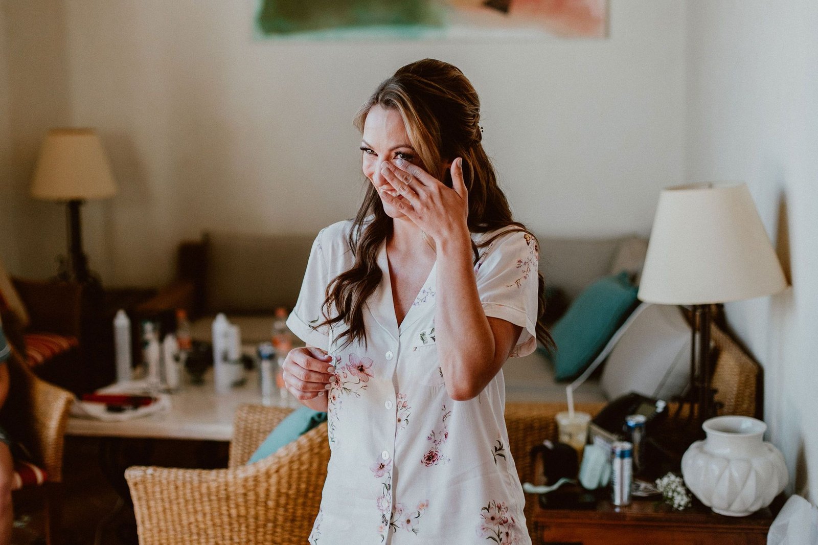 Bride reading a card her soon to be future husband wrote her right before their wedding ceremony. She was in her Bridal Suite at Cabo del Sol, in Los Cabos, Mexico. Wedding Planning was done by us, Cabo Wedding Services, and the photography was done by Ana and Jerome.