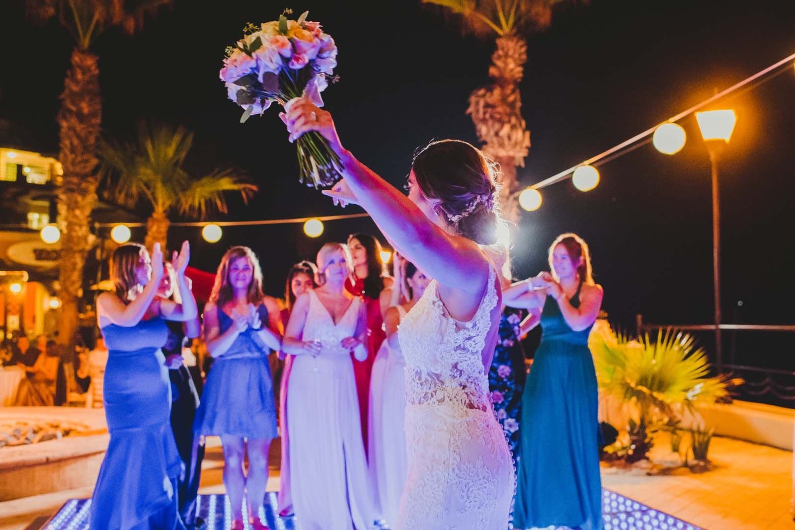 Bouquet toss for the Bride and Groom on their wedding day.