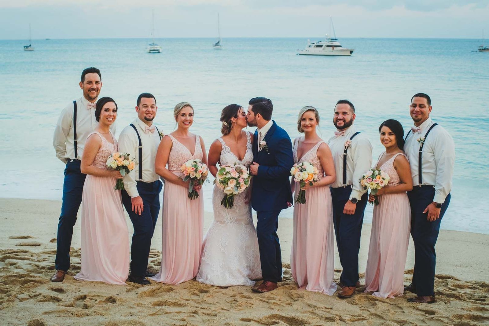 Bridal Party on the beach in Los Cabos, right in front of Villa del Palmar, where her wedding reception is.