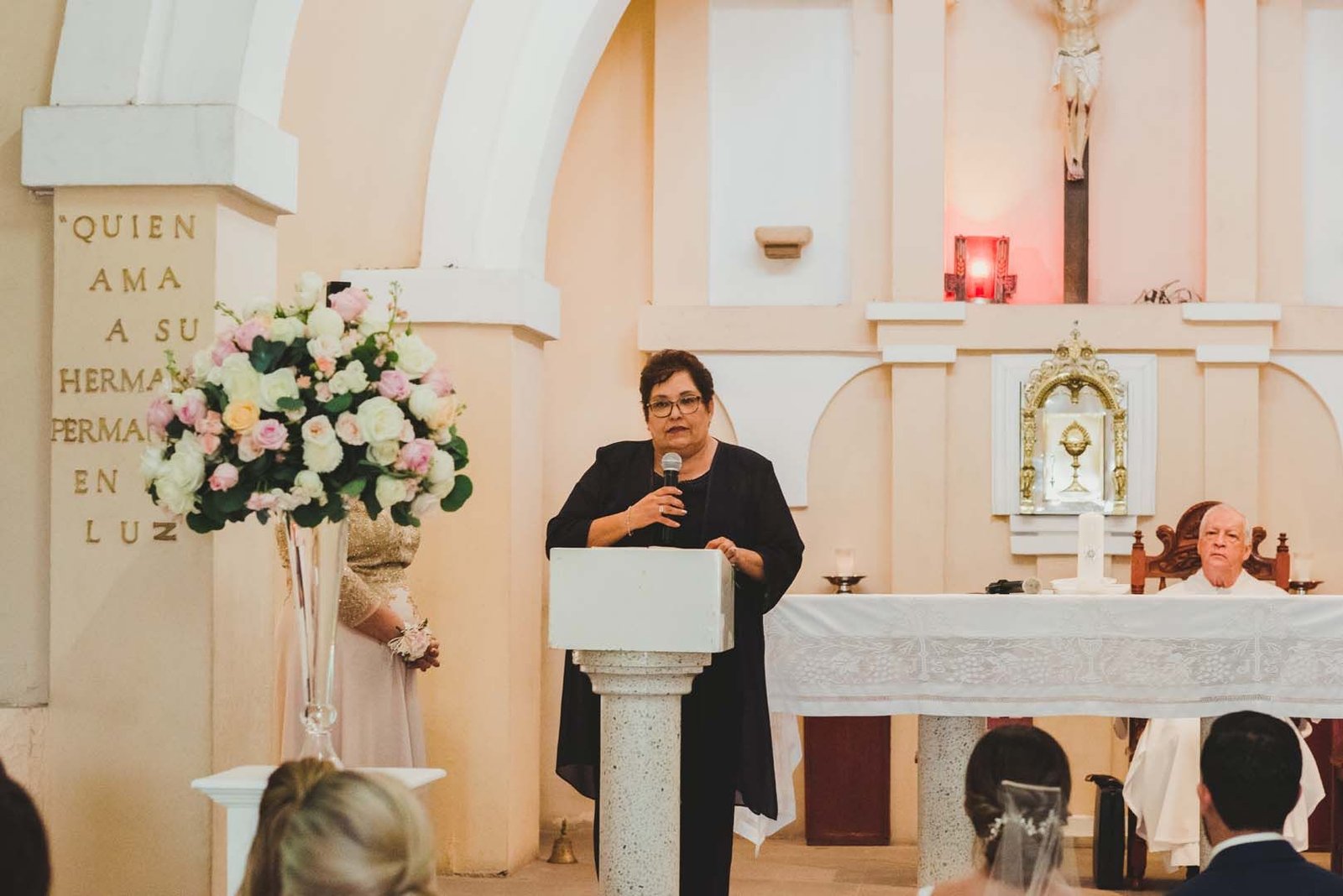 Mother of the Groom praying during the Ceremony in Los Cabos Mexico. This wedding took place in a little church in Los Cabos where only the closest family and friends of the bride and groom attended. Wedding Planning was done by Cabo Wedding Services and they were staying at Villa del almar in Los Cabos from the Villa Group,