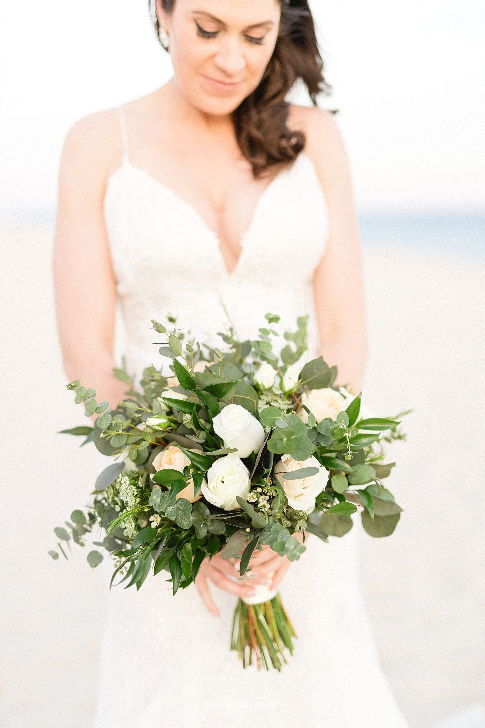 Bride with her Bouquet on her wedding day. Destination Wedding in Cabo Mexico. Wedding Planning by Cabo Wedding Services.