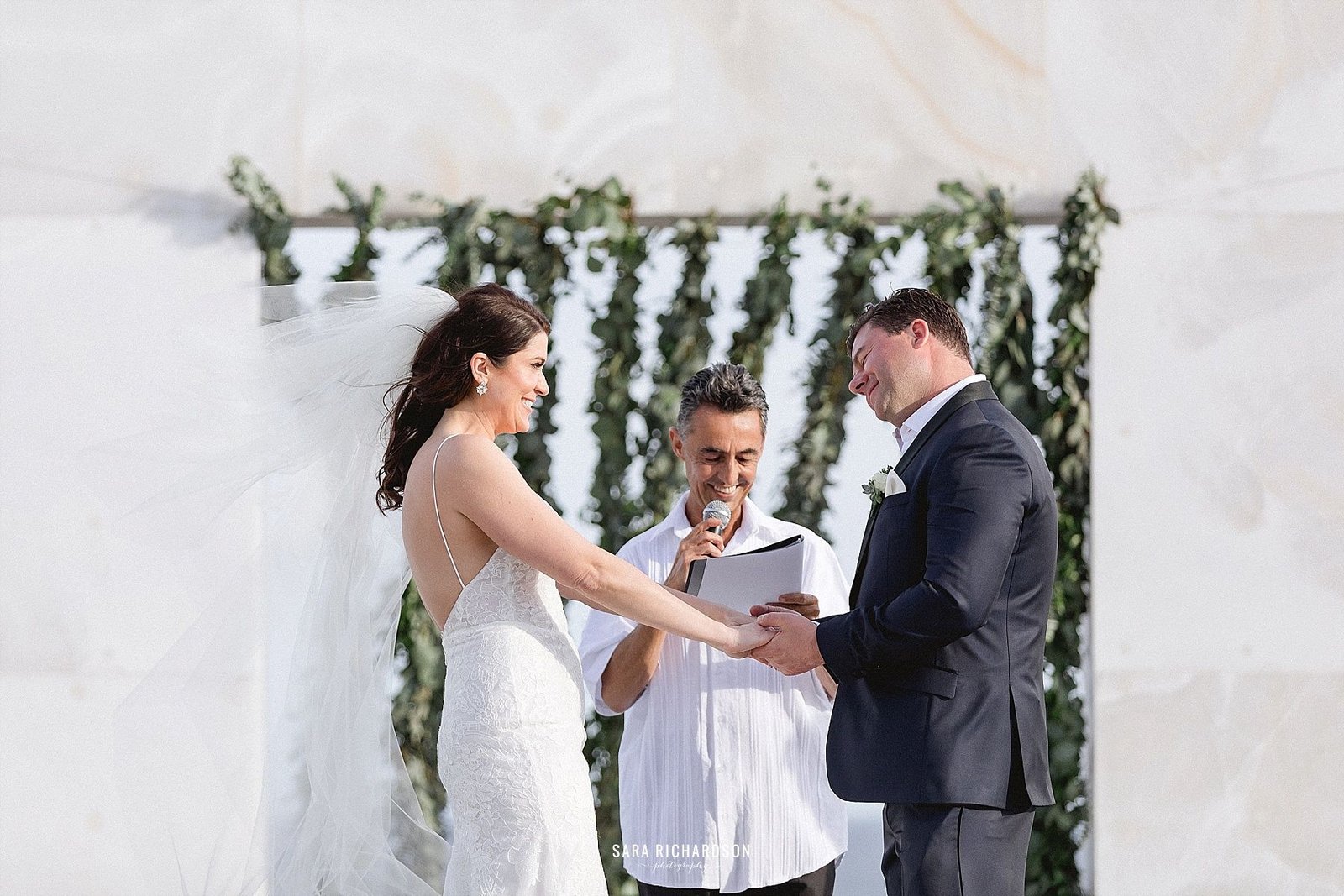 Bride and Groom saying their vows in LeBlanc Los Cabos. Photography was done by Sara Richardson and wedding planning was done by Cabo Wedding Services.