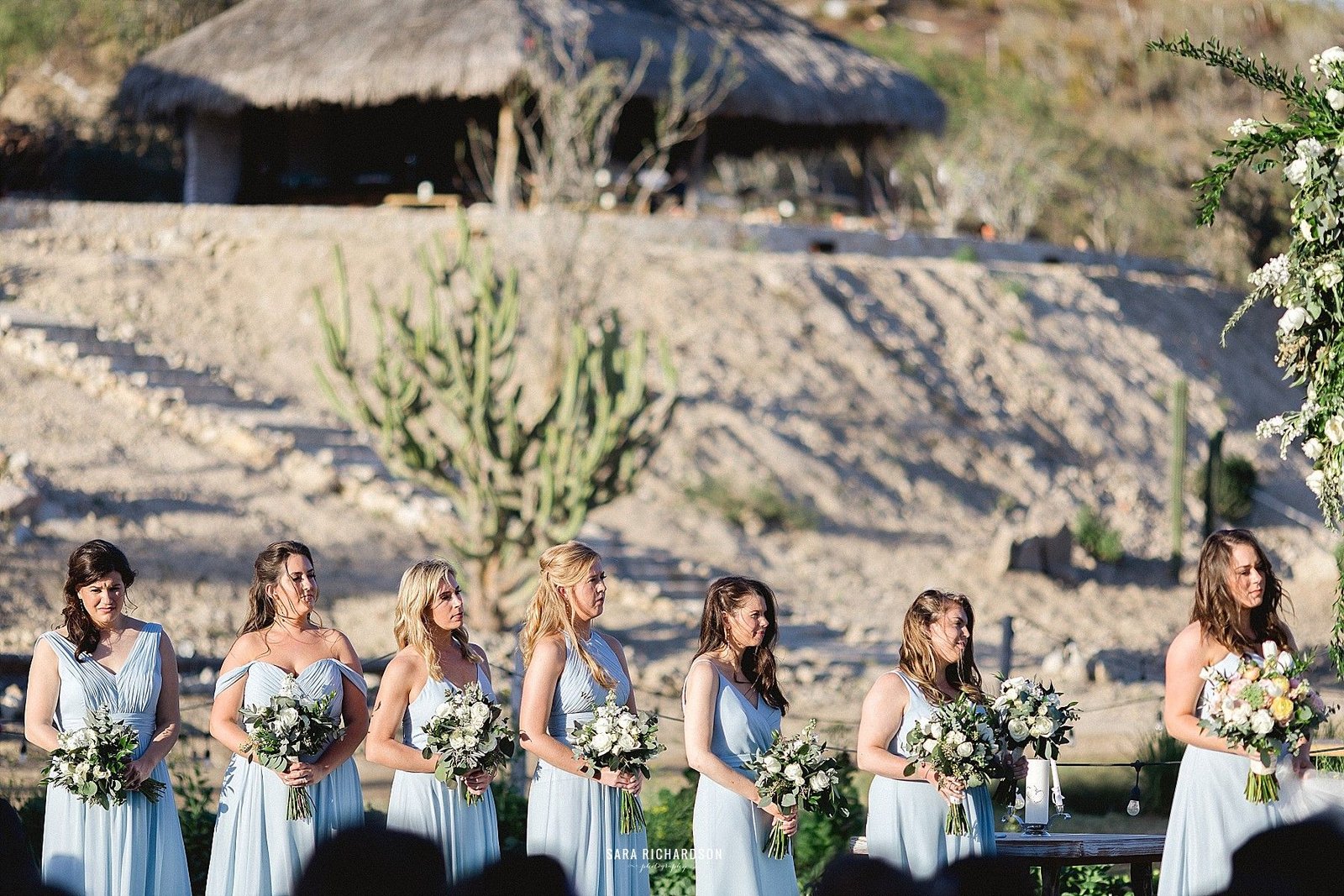 Bridesmaids standing by the Brides side as she says her I do's to the love of her life!