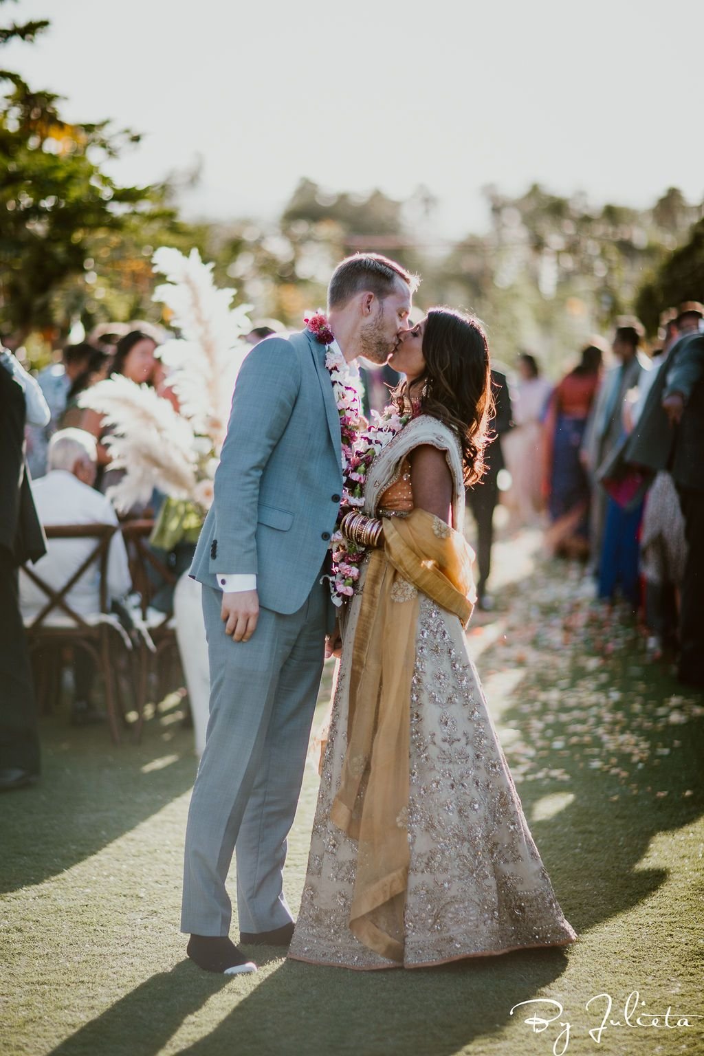 Bride and Groom right after the Wedding Ceremony. They were doing their processional at their wedding venue, Flora Farms, in Los Cabos Mexico. Cabo Wedding Services was the Wedding Planner.