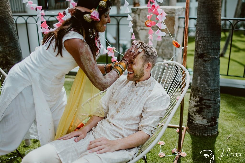 Bride smearing Turmeric during her Indian Wedding in Los Cabos Mexico