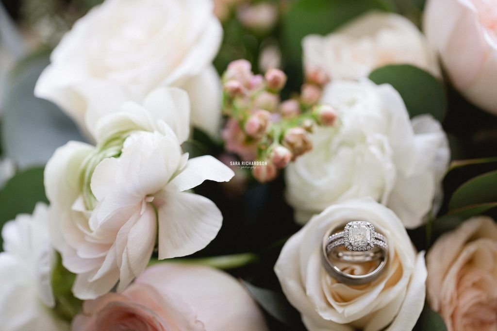 Brides Flowers she decided to use for her wedding day. She went with imported Garden Roses, Peonies and the photographer decided to put her wedding ring in the bouquet to give it more of a look.