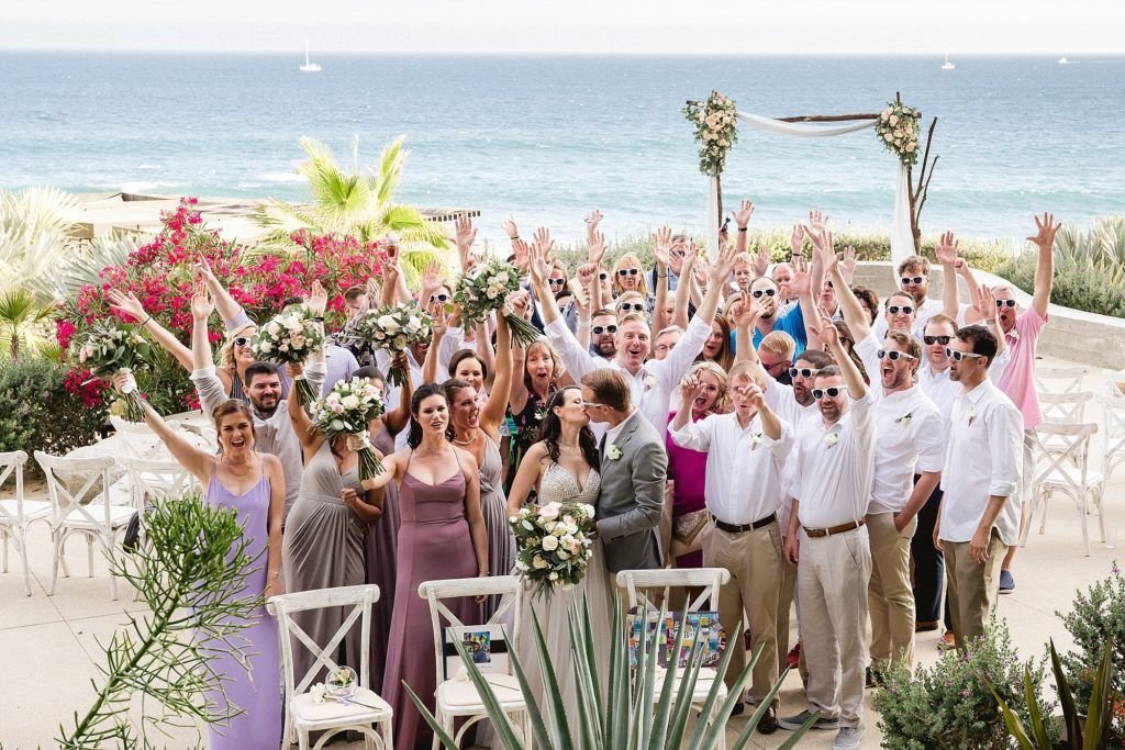 Group  Photo celebrated at The Cape by Cabo Wedding Services. Wedding planning was done by Cabo Wedding Services