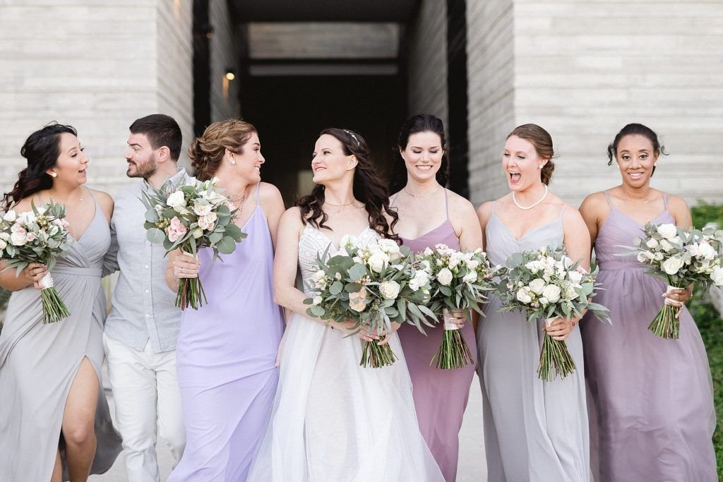 Bride with Bridesmaids doing a Photo Session with their bouquets and in their Bridesmaid Dresses. This wedding was done at The Cape in Los Cabos Mexico. Destination Wedding Planner was Jesse Wolff by Cabo Wedding Services