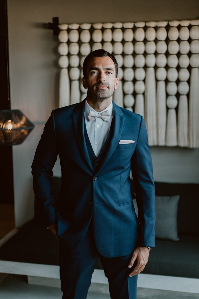 Groom getting ready right before the ceremony took place in Los Cabos Mexico. The groom as wearing a suite by Armani.