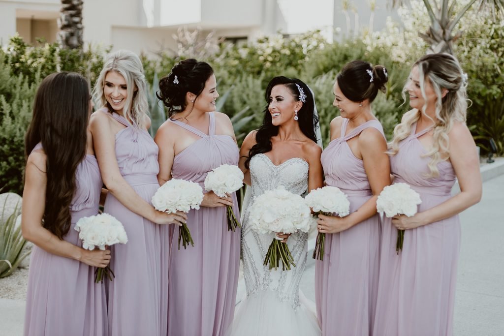 Bride with her bridesmaids all dressed up getting a photo shoot.
This was right before the wedding ceremony took place at The Cape hotel. This was in Los Cabos, Mexico. It was a destination wedding, planned by Cabo Wedding Services.