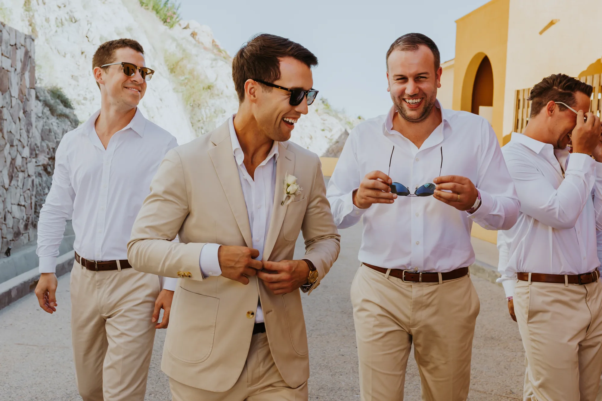 Groomsmen walking together to a wedding in Cabo San Lucas