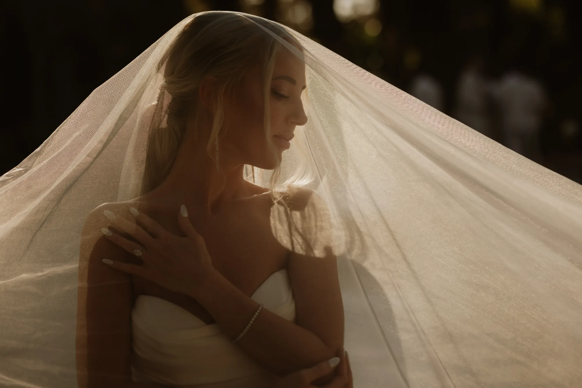 Golden-hour ceremony during peak wedding season in Cabo San Lucas