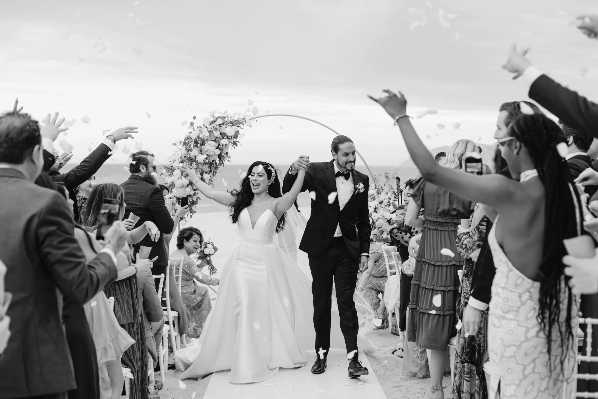 April wedding celebration in Cabo San Lucas with golden evening light