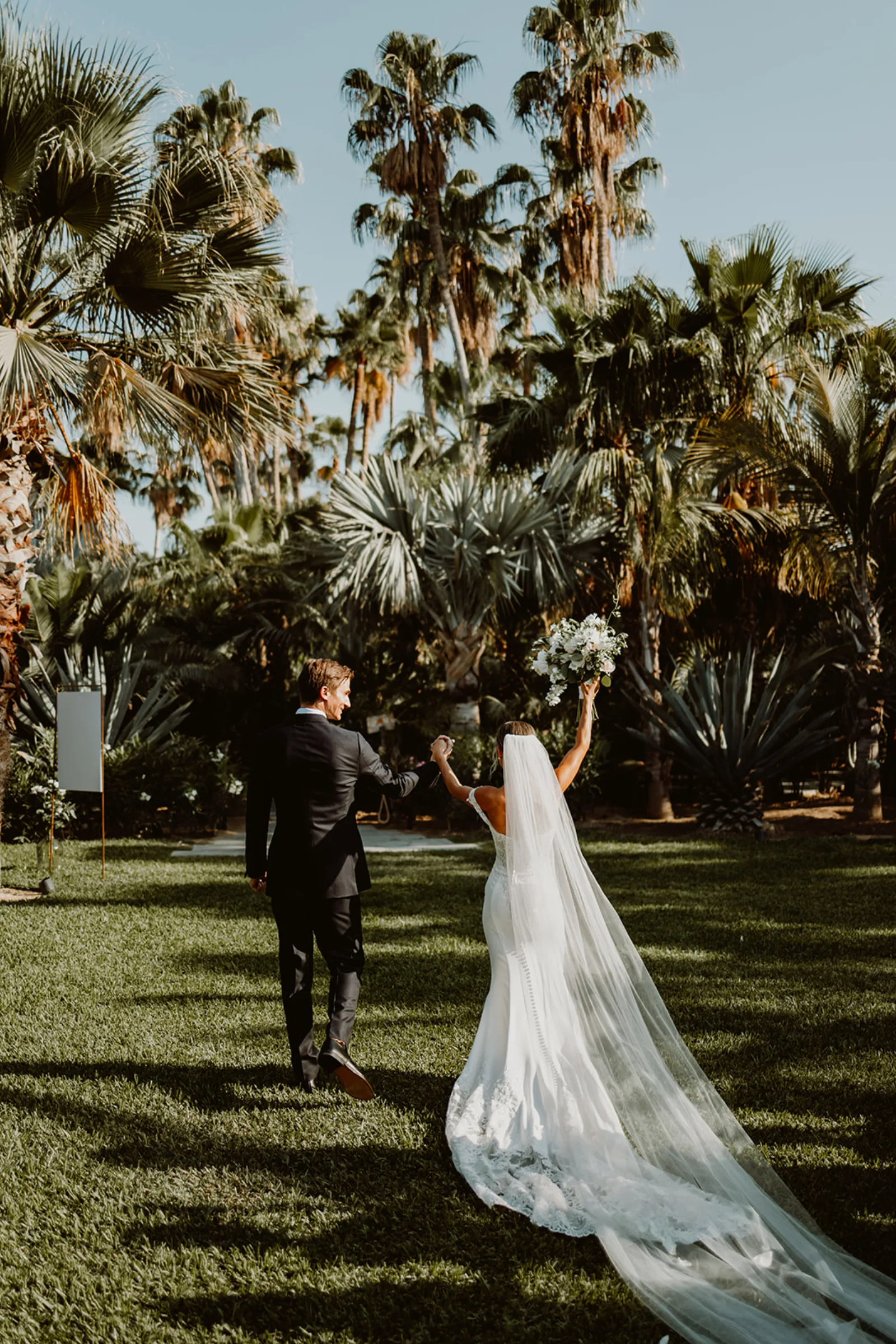 Planner building a custom Cabo wedding scope with the couple