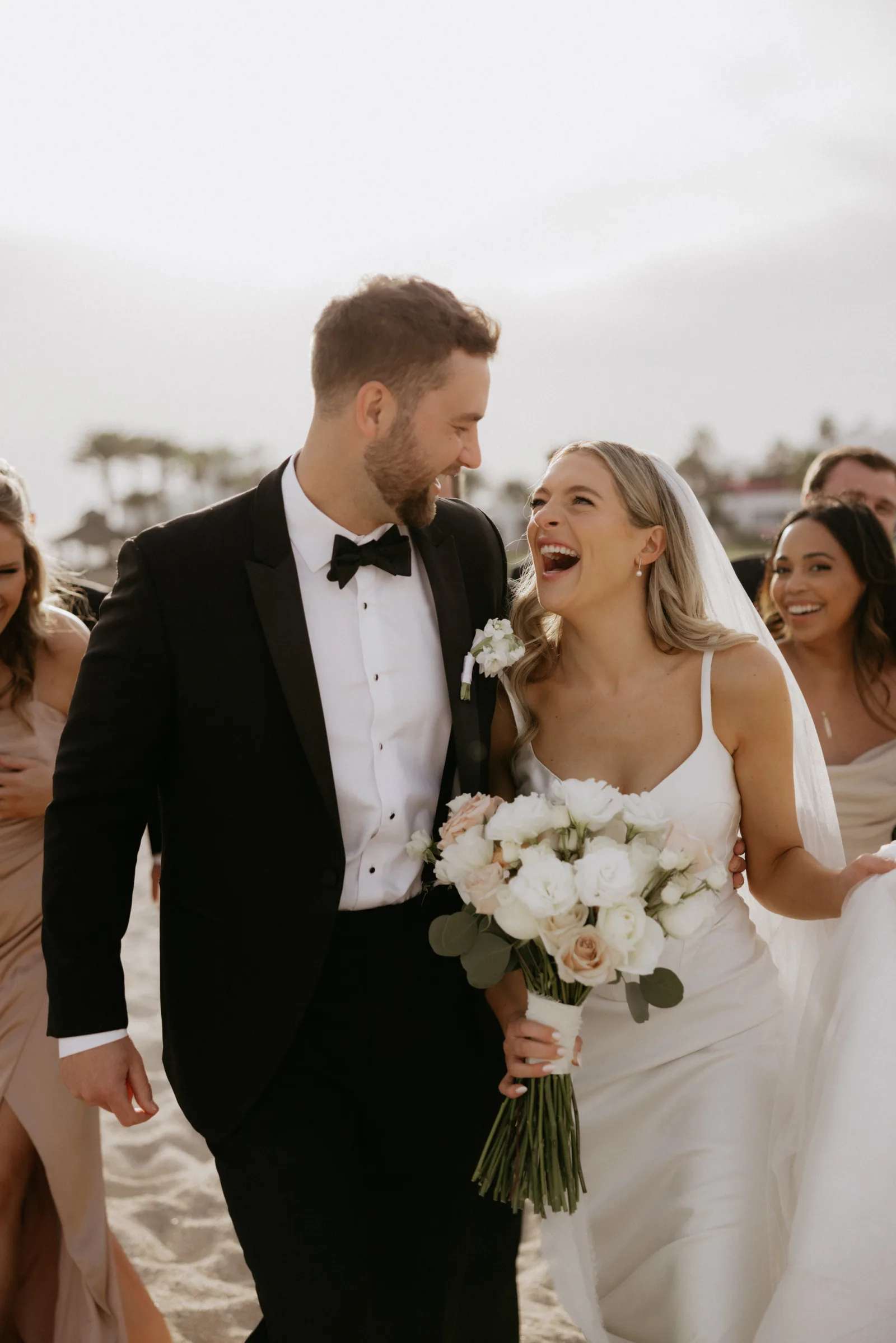 Couple reading a wedding review moment after their Cabo celebration