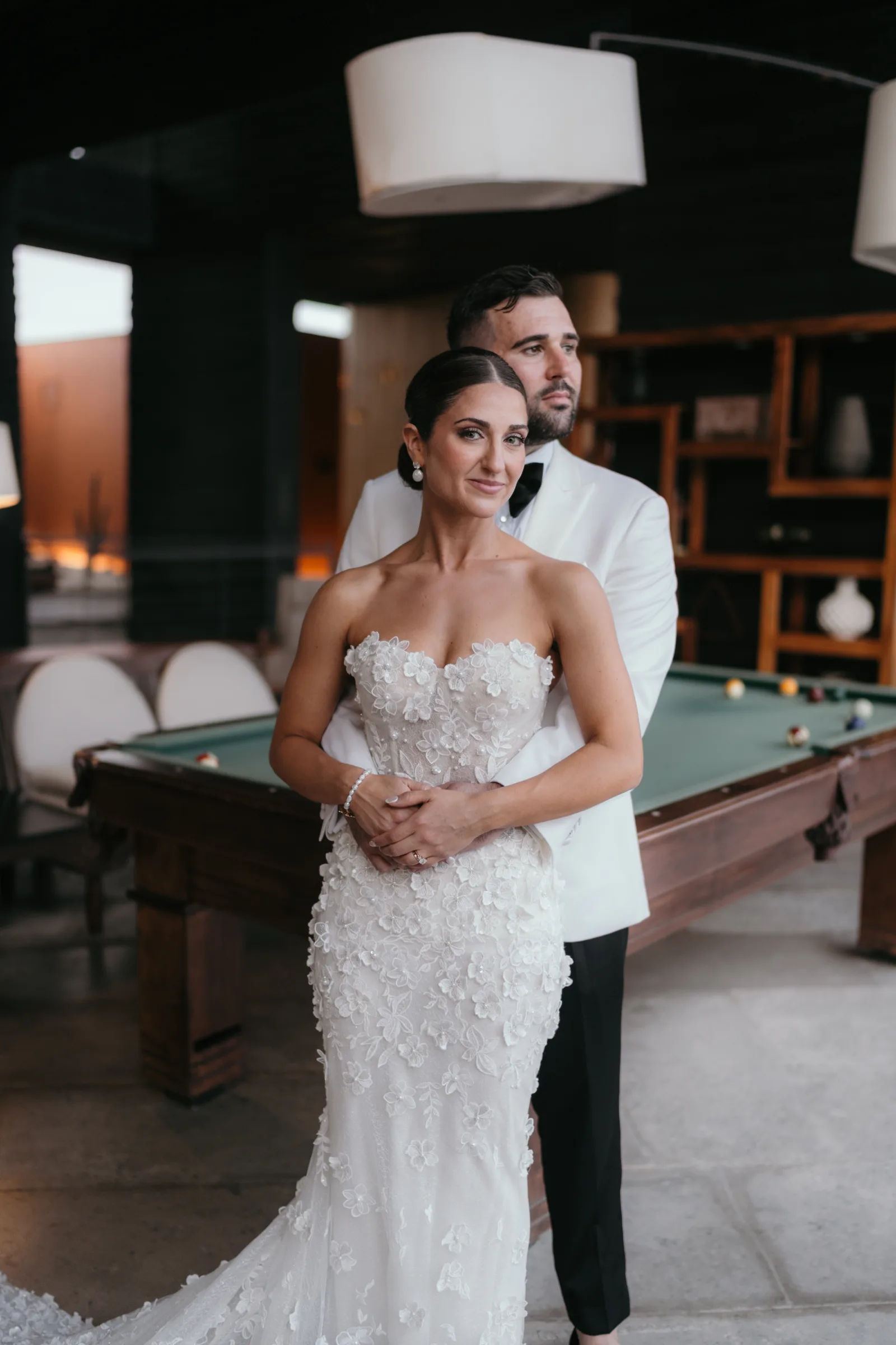 Couple portrait indoors after their wedding in Cabo