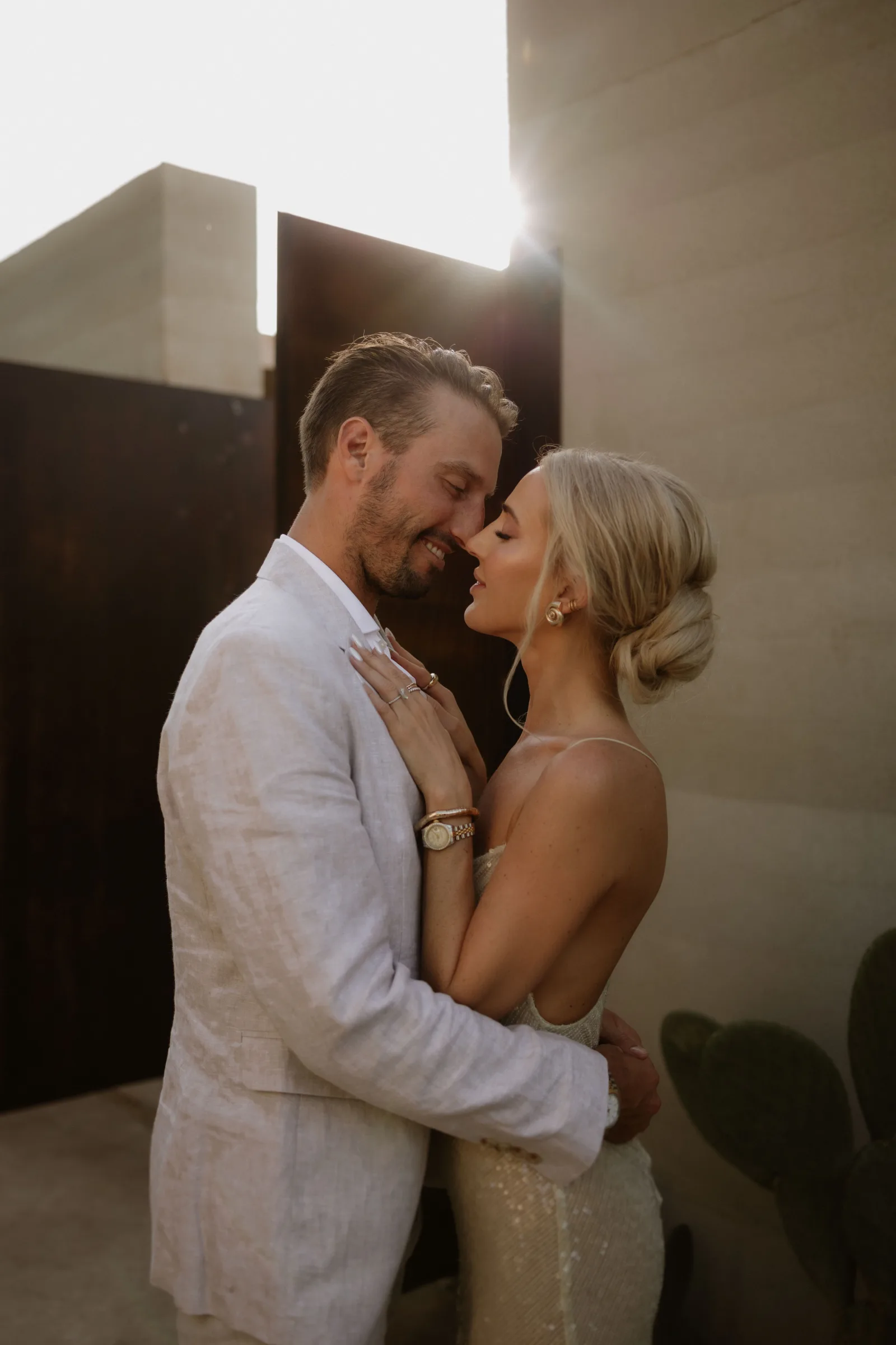 Couple discussing Cabo wedding costs with their local planner