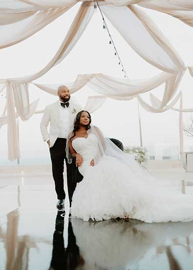 A happy couple after their destination wedding in Cabo.