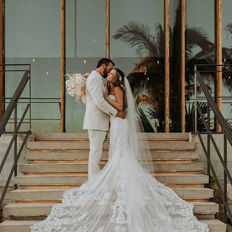 Kylie and Peter Cabo wedding at The Cape — produced by Cabo Wedding Services