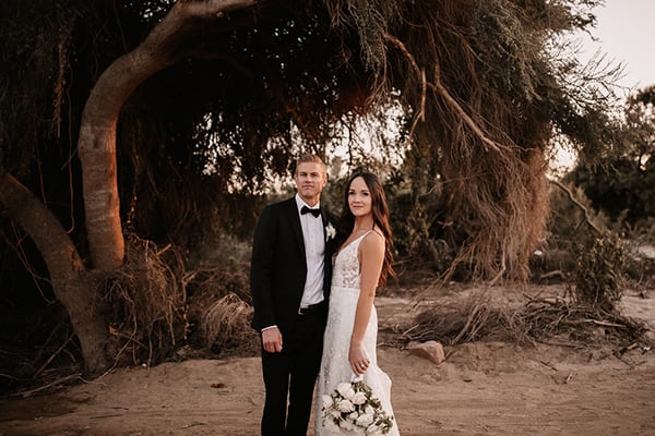 Acre Baja wedding setup in Cabo — couple in agave fields