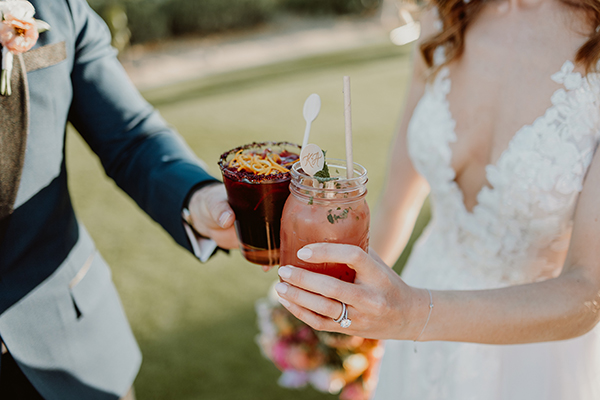 Flora Farms wedding setup in Cabo — bride and groom in lush gardens