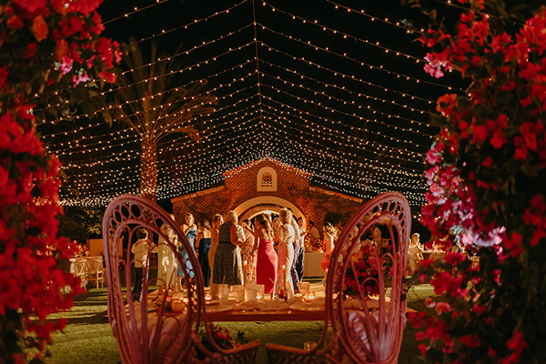 Flora Farms wedding setup in Cabo — romantic moment in the farm gardens
